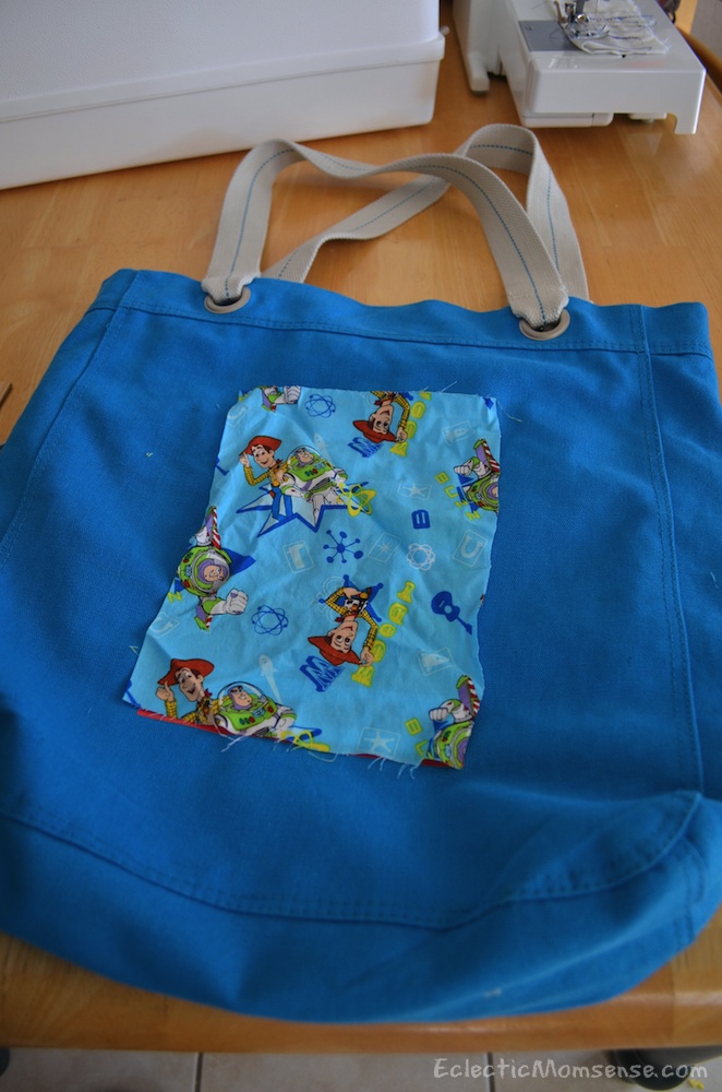 A promotional reusable tote becomes a fashionable library tote for kids. #upcycle #recycle #craft