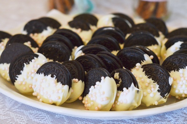 Shabby Chic Baby Shower | Dipped chocolate sandwich cookies with pearl candy accents.